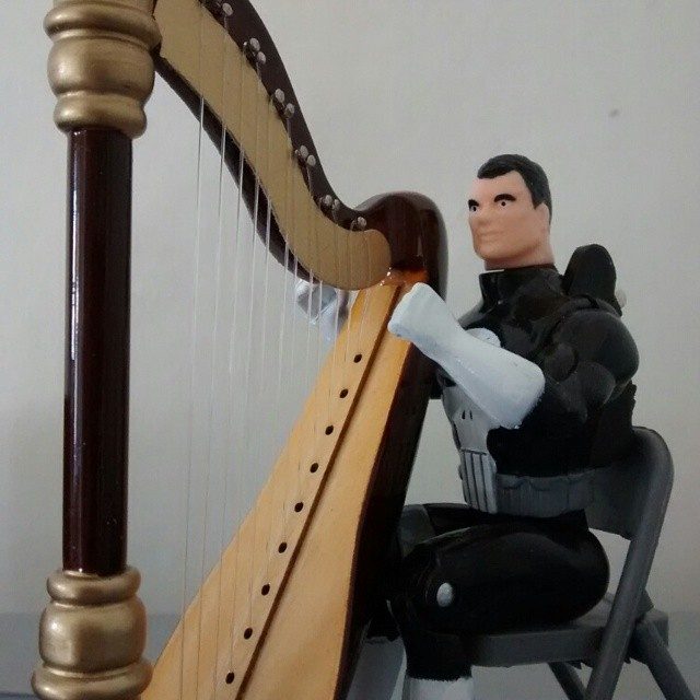 The Punisher from Toybiz Harping it out.