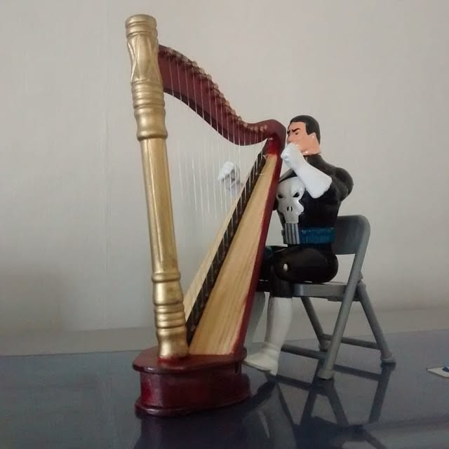 The Talking Punisher with his new harp.