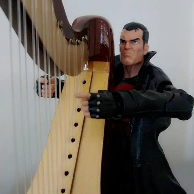 Thunderbolts Punisher variant is deep in his thoughts as he plays his harp.