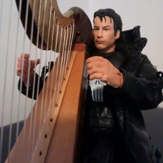 Thomas Jane as The Punisher on his harp.