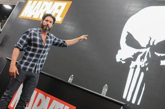 Jon Bernthal pointing to the most badarse symbol ever!