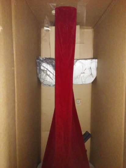 Grover, the harp, is inside the box underneath the red cover.