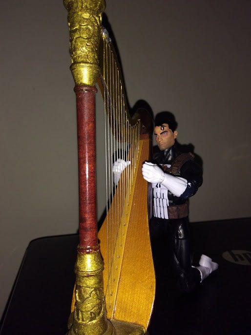 Playing his harp in the dark