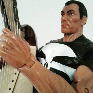 Punisher and his harp playing.