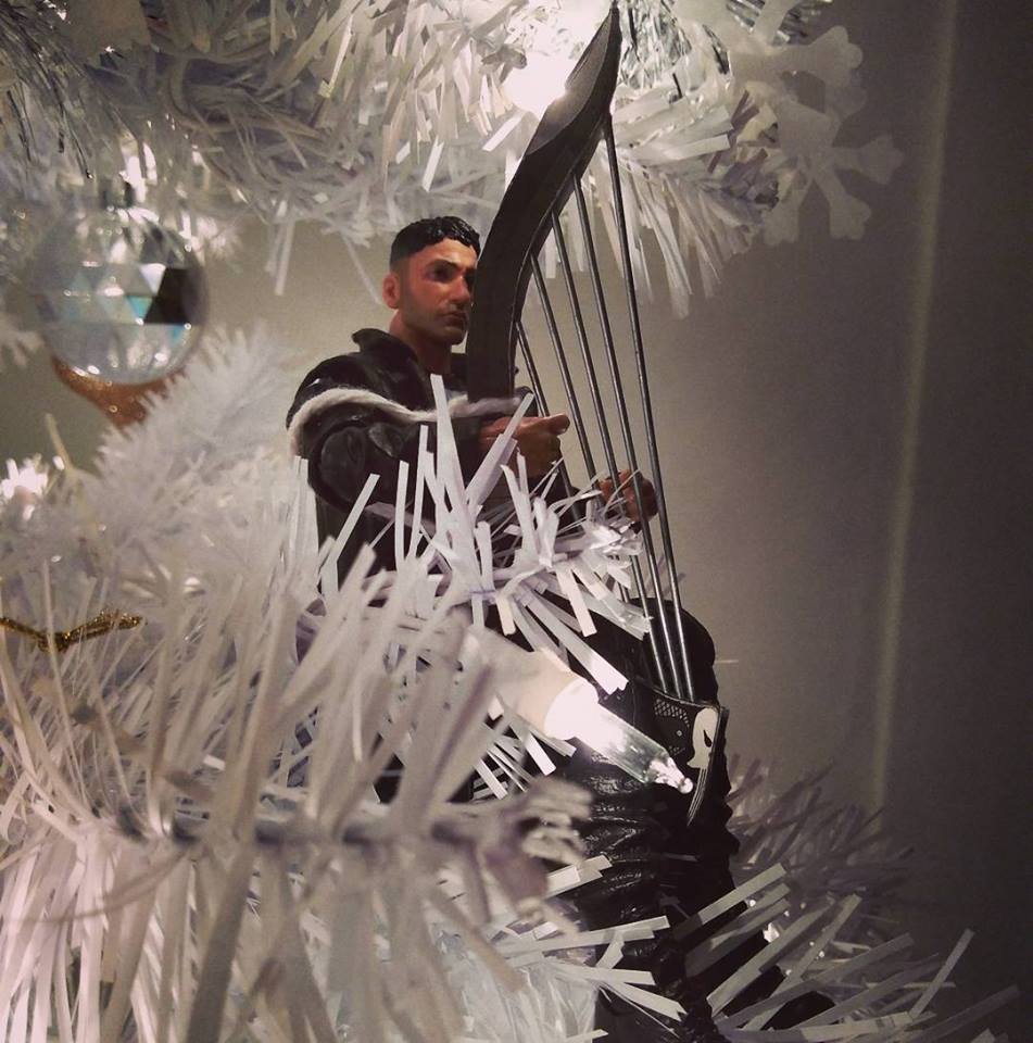 Jon Bernthal as The Punisher Harping out Christmas Carols.