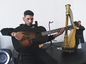 The two Jon Bernthal Punishers playing on the harp and guitar.